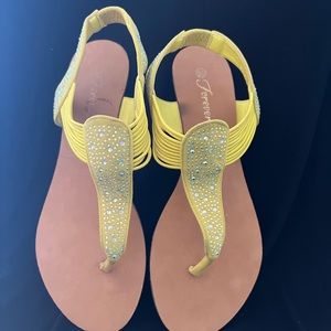 Flat sandals, bright yellow with rhinestone design